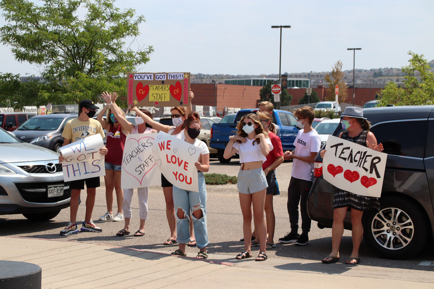 Community members cheered and honked for Douglas County school employees. Teachers returned to work on Aug. 4 as they prepare for students to start the year on Aug. 17.